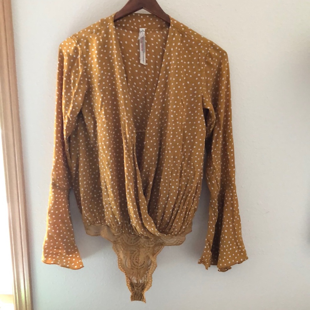 Bodysuit with flared sleeves